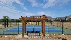 2 pickleball with pergola's